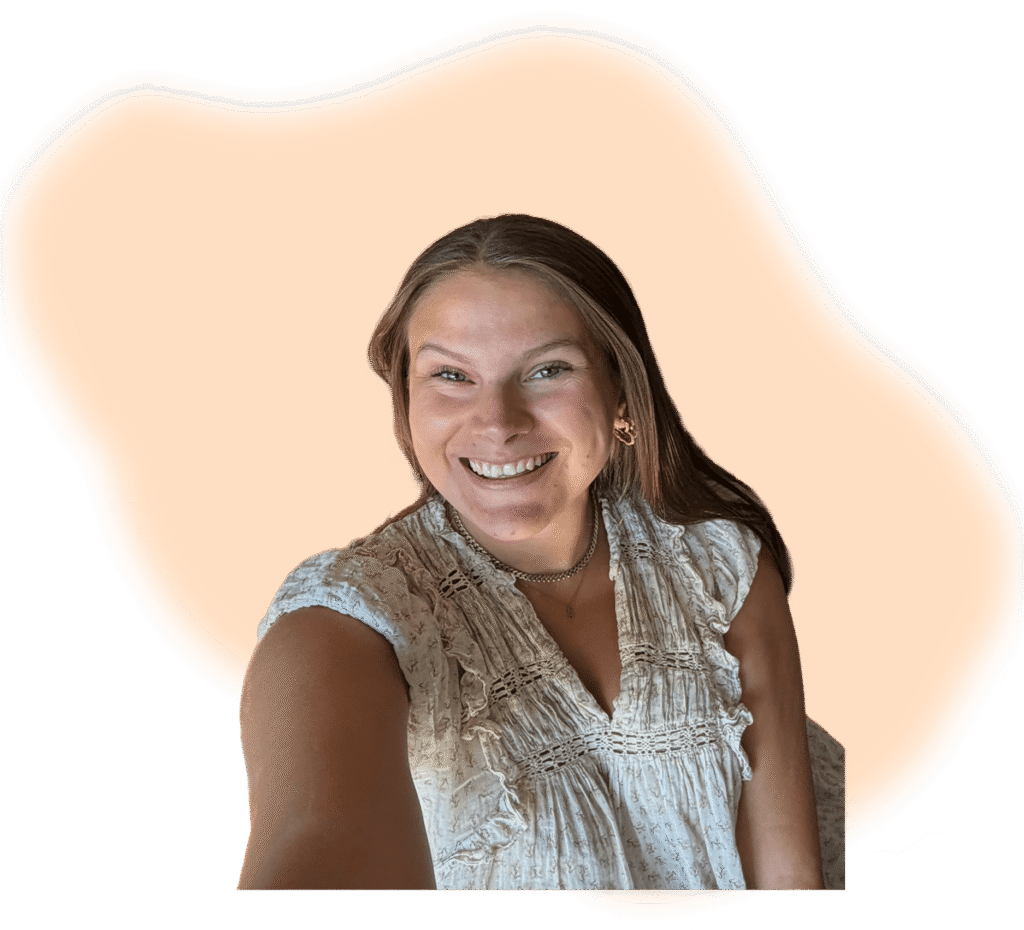 Profilbillede af Natacha, med en organisk orange form bagved